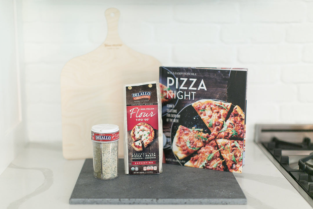 Pizza themed gift box for Mercy Forest Co. with Delallo '00' flour, pizza sauce, and seasonings set. Also comes with Williams Sonoma Pizza Night cookbook, lava stone, and pizza peel. Customize your peel for a bespoke gift!