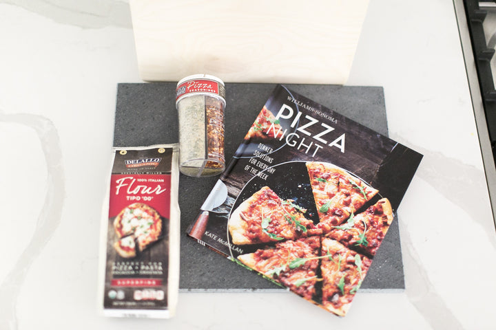 Black Lava Stone with Pizza themed items. Gift box for clients, new homeowners, real estate, gratitude