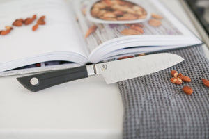 custom curated cooking gift box with custom knife, cookbook, and kitchen towel