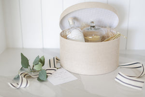 For the realtor who wants to make a lasting impression: This elegant gift box is filled with high-quality items that your clients will truly appreciate, including a luxurious candle, a decorative cloche, essential wick care tools, and stylish matches. Mercy Forest Co. is your client gifting solution