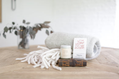 Custom curated comfort gift box with bath bomb, candle, cozy blanket, and journal. Beautiful and meaningful gifts ready to ship in the moment with Mercy Forest Co.