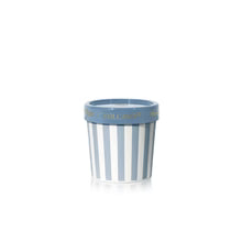 Capri Blue Volcano scent candle with blue and white striped metal container,  on a white background