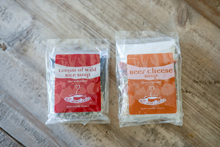 Choice of Secret Garden Beer Cheese or Wild Rice Soup included in the gift box, offering a warm, comforting option for clients. Realtors can use this thoughtful gift to create a lasting impression during relocation or home anniversary gifting.