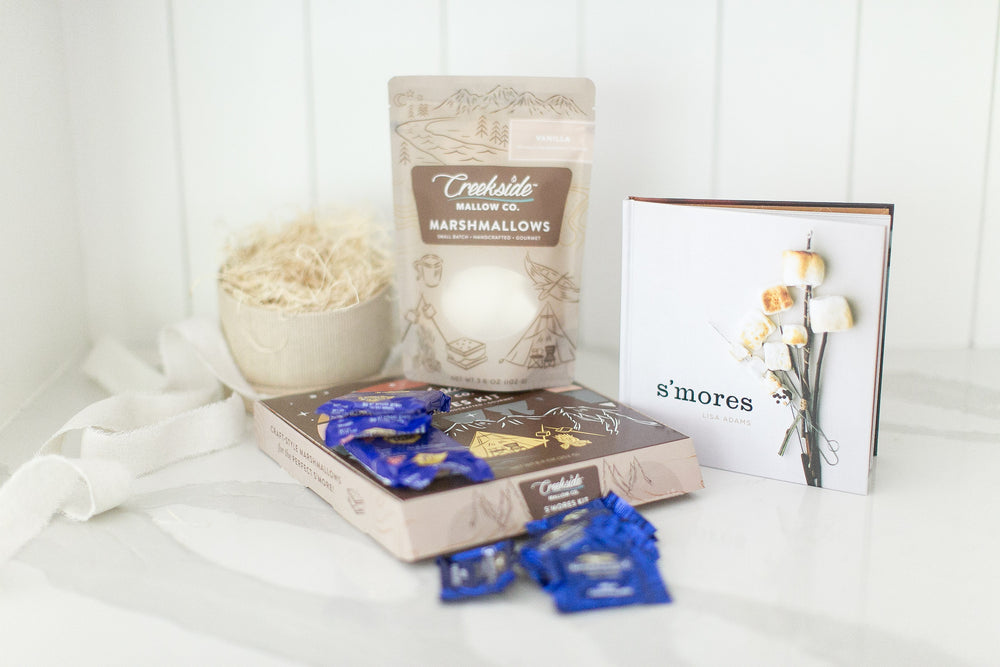 S'mores themed gift box with everything you need to have an evening making S'mores! Chocolate, graham crackers, and vanilla marshmallows included