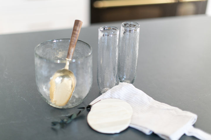 Classic Kitchen staples with glass ice bucket, stemless champaign flutes, inlayed bone coaster set and linen tea towel. 