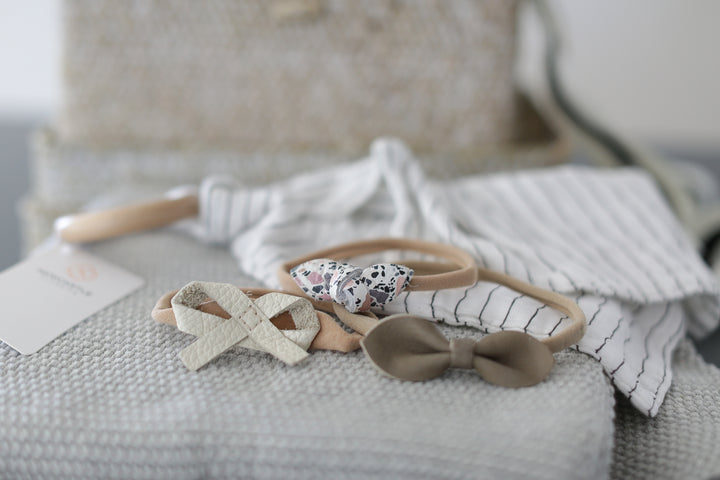Add a unique and stylish touch with an optional leather paci clip or headband, available in various colors and styles (sold separately). Ready to ship with Mercy Forest Co.