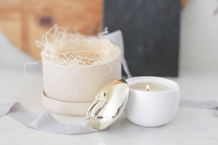 Simple and beautiful apple candle with brass painted ceramic top. 