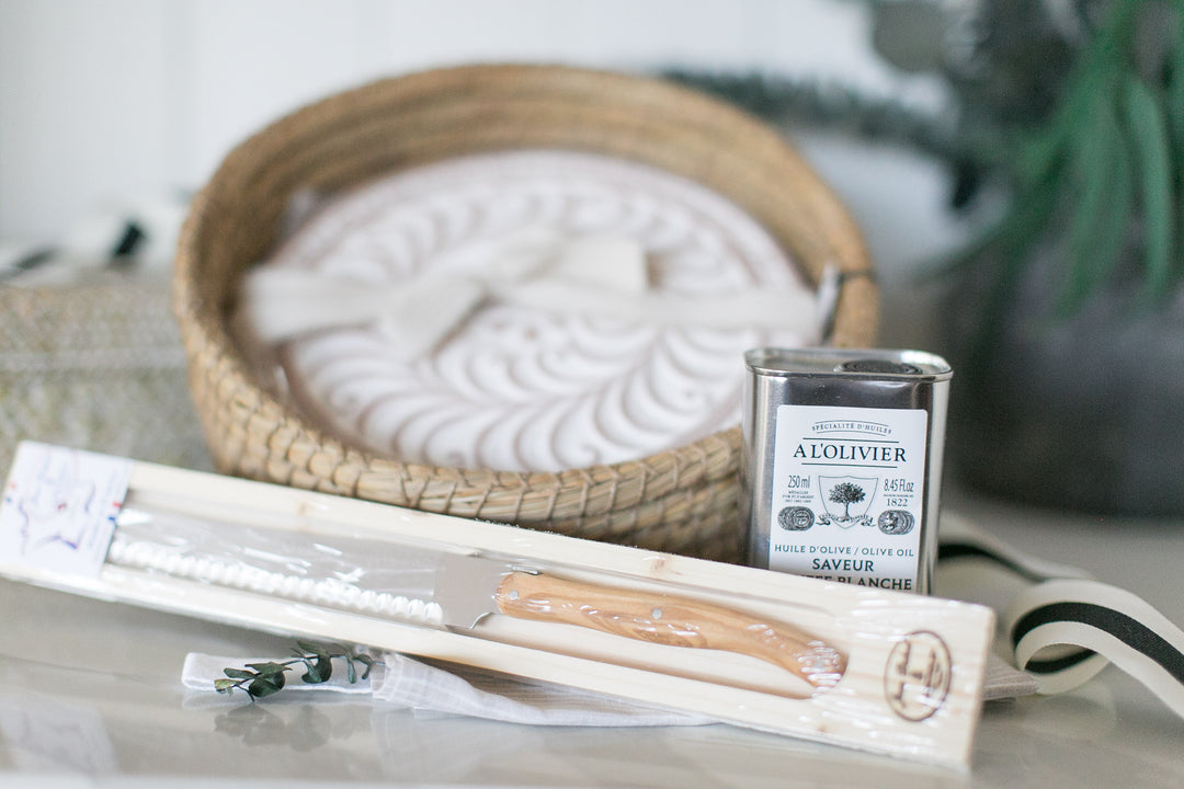 L'Olivier soap with wooden packaging on a neutral background