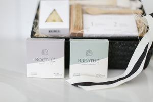 Comfort gift for those in need of self care, includes Nash and Jones clay mask, sea sponge and shower steamers. Gift is ready to ship in black woven basket with lid and ribbon. Mercy Forest Co. gifting. Custom curated gifts that are ready to ship and be delivered, spa inspired gift box with shower steamer options of either lavender or eucalyptus 