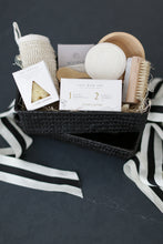 Load image into Gallery viewer, Spa inspired gift box, Comfort gift for those in need of self care, includes Nash and Jones clay mask, sea sponge and shower steamers. Gift is ready to ship in black woven basket with lid and ribbon. Mercy Forest Co. gifting. Custom curated gifts that are ready to ship and be delivered. 
