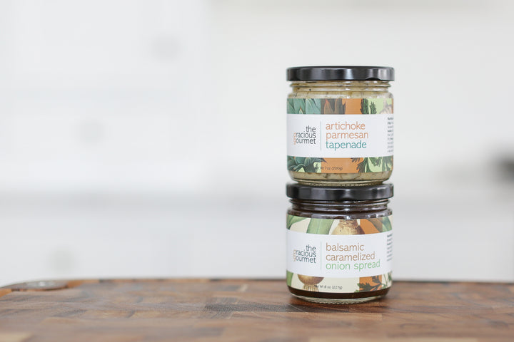 Complete your Mercy Forest Co. gift by adding on both of The Gracious Gourmet Balsamic Caramelized Onion spread and Artichoke Parmesan Tapenade!