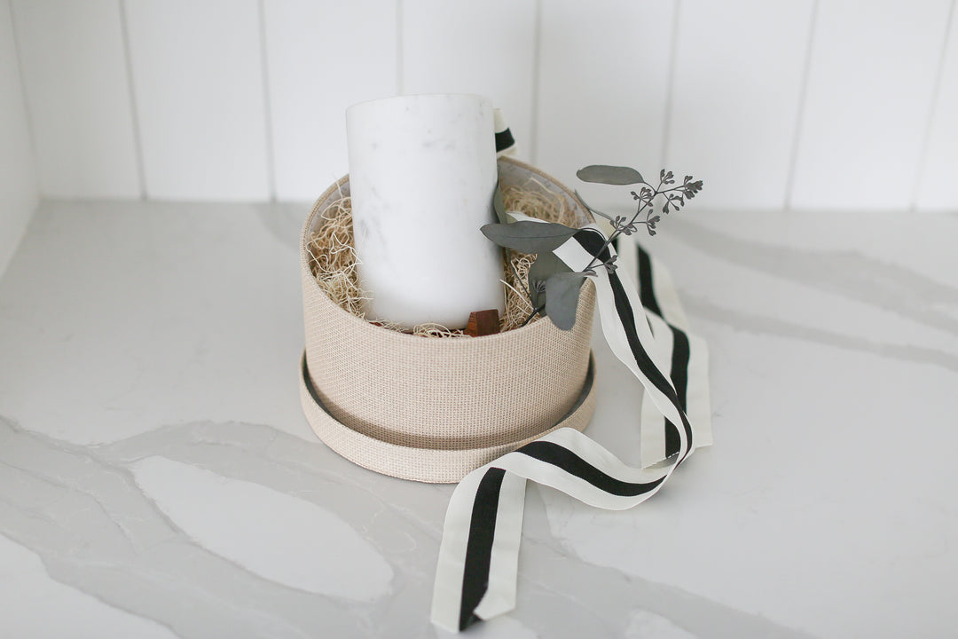 Marble vase or bottle holder with wood base ready to ship gift. Mercy Forest Co. makes it simple and meaningful to send gifts to your clients and employees.