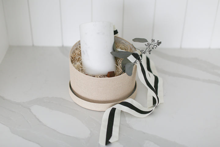 Marble vase or bottle holder with wood base ready to ship gift. Mercy Forest Co. makes it simple and meaningful to send gifts to your clients and employees.