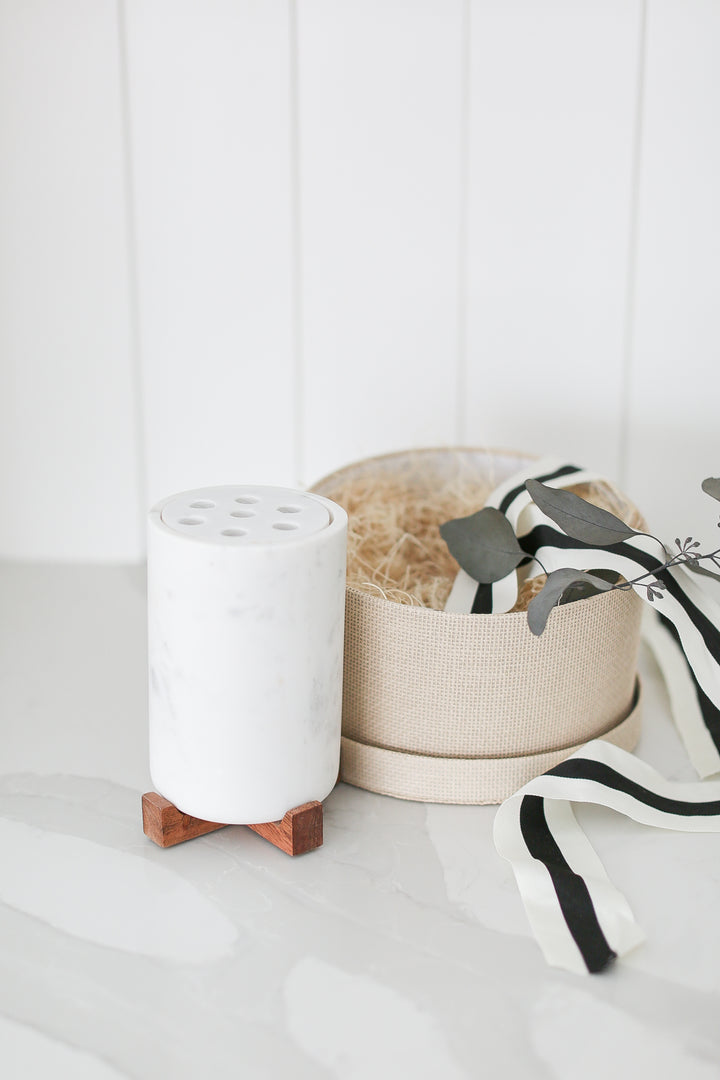 Marble vase with wood base and round woven box. Ready to ship gifts with Mercy Forest Co. 