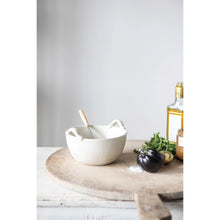 Load image into Gallery viewer, Creamy white stoneware bowl with wood handled whisk. Large found cutting board and oils. Mercy Forest Co. gifting. Ready to ship gits.