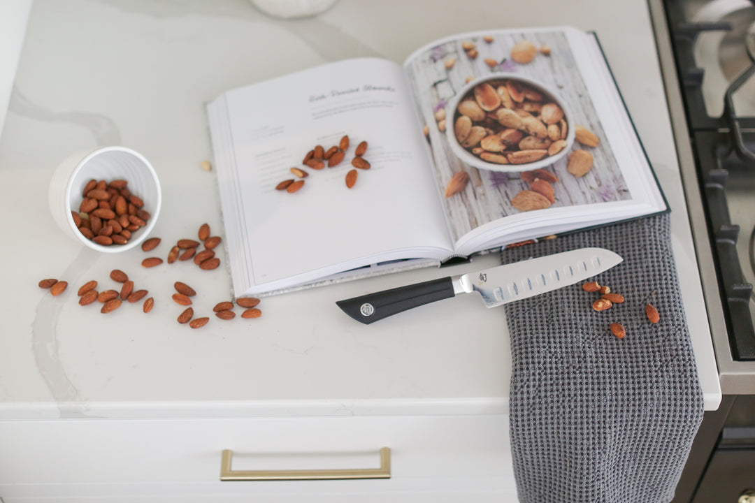 custom curated cooking gift box with custom knife, cookbook, and kitchen towel