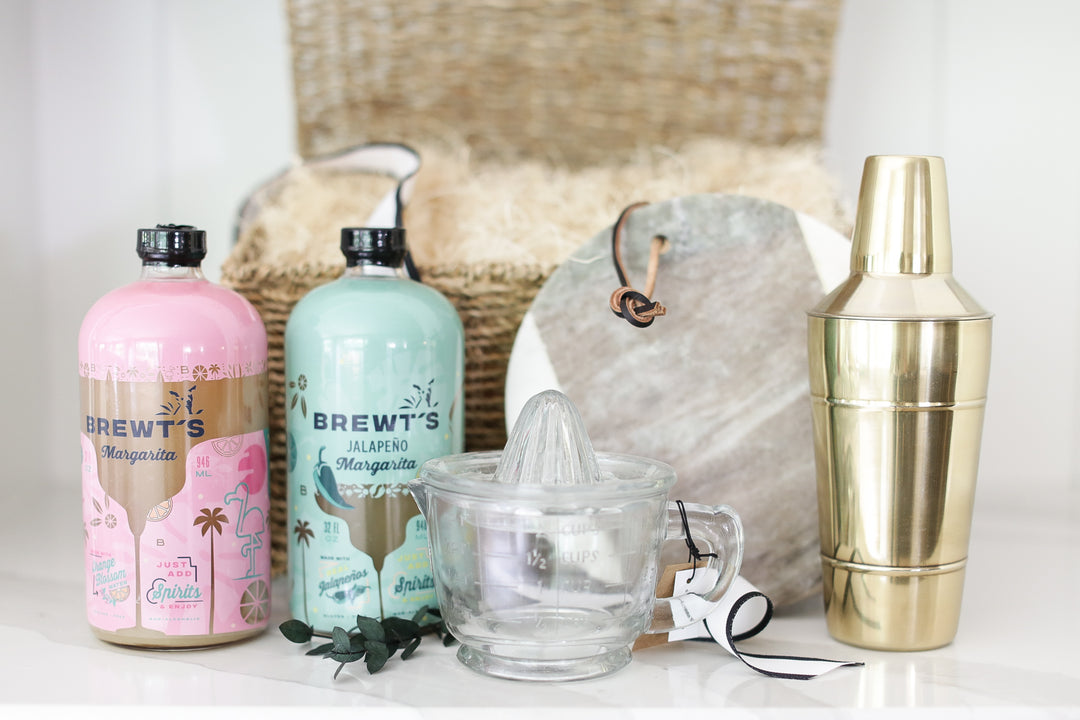 Strengthen client relationships with the gift of unforgettable experiences! This curated margarita basket is the ideal choice for realtors and preferred vendors to show appreciation and celebrate milestones. Featuring premium ingredients and stylish barware, it's a guaranteed crowd-pleaser. Build lasting connections and order yours today!
