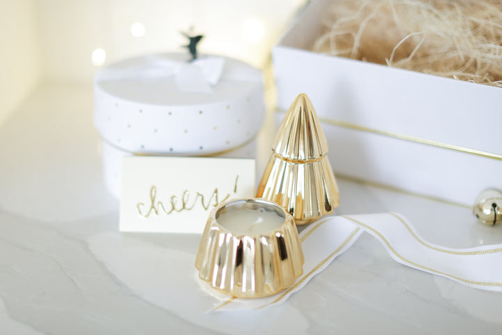 Gold gilded candle in mulled cider. total burn time is 15 hours. Simple and intentional gifting with Mercy Forest Co. 