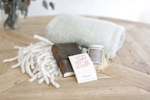 Load image into Gallery viewer, Custom curated comfort gift box with bath salts, candle, cozy blanket, and journal
